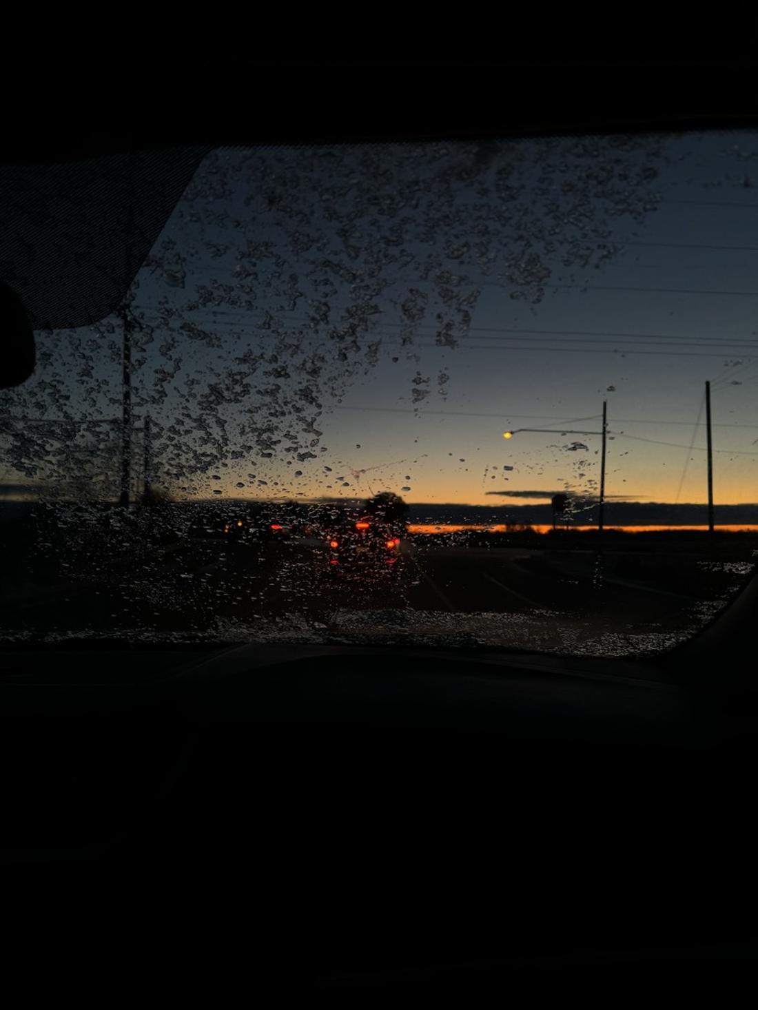Dusk through a dirty windshield